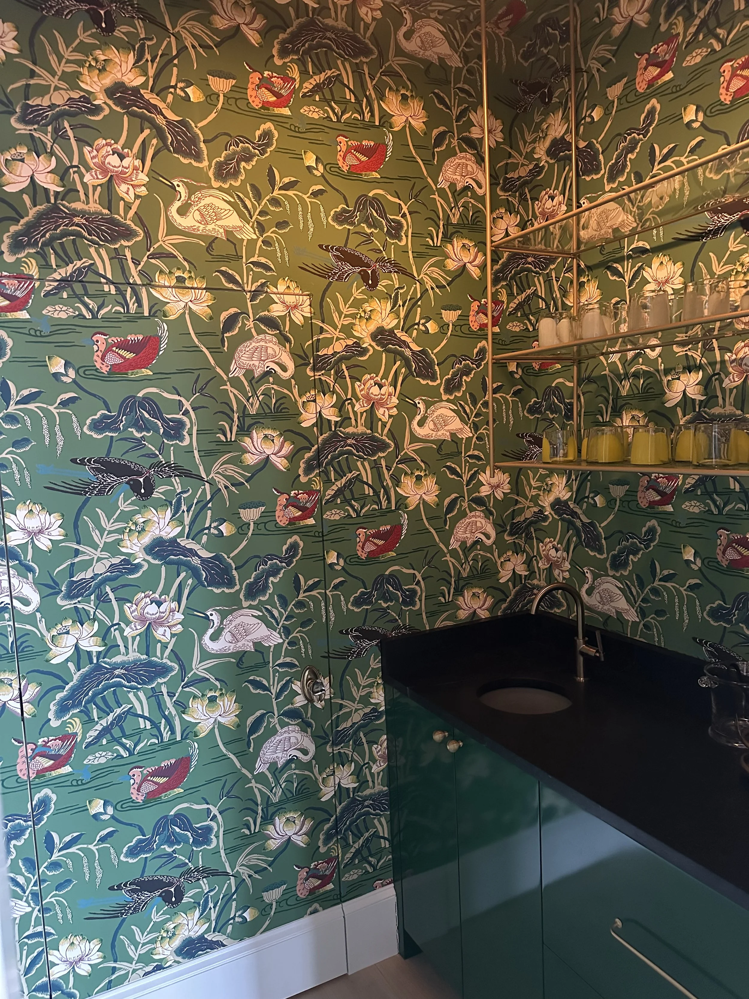 Home bar with hidden door to powder rm.jpeg