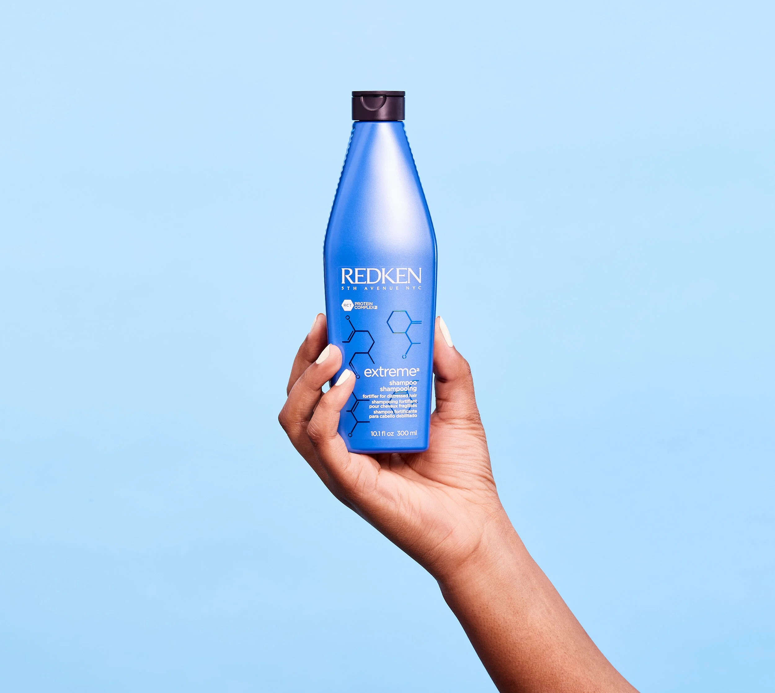 In_Hand_Light_Blue_Redken_Extreme_Shampoo_024_R3_c.jpg