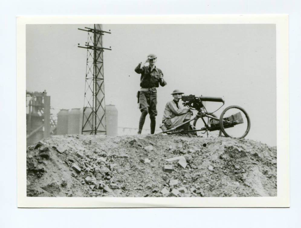 Machine gunners on hot metal bridge in Warren. Trumbull Cliffs furnace in background. Courtesy of Ohio Memory Connection. 