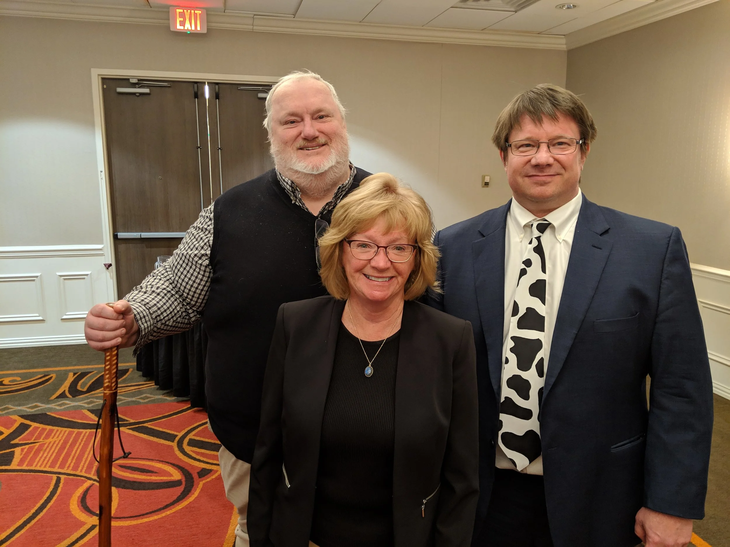 Agri Mark’s Bob Wellington (L) and Farm Credit East’s Chris Laughton (R) join UConn’s Dairy Science professor Sheila Andrew at the March 21st Dairy Nutrition Conference in Windsor Locks CT.