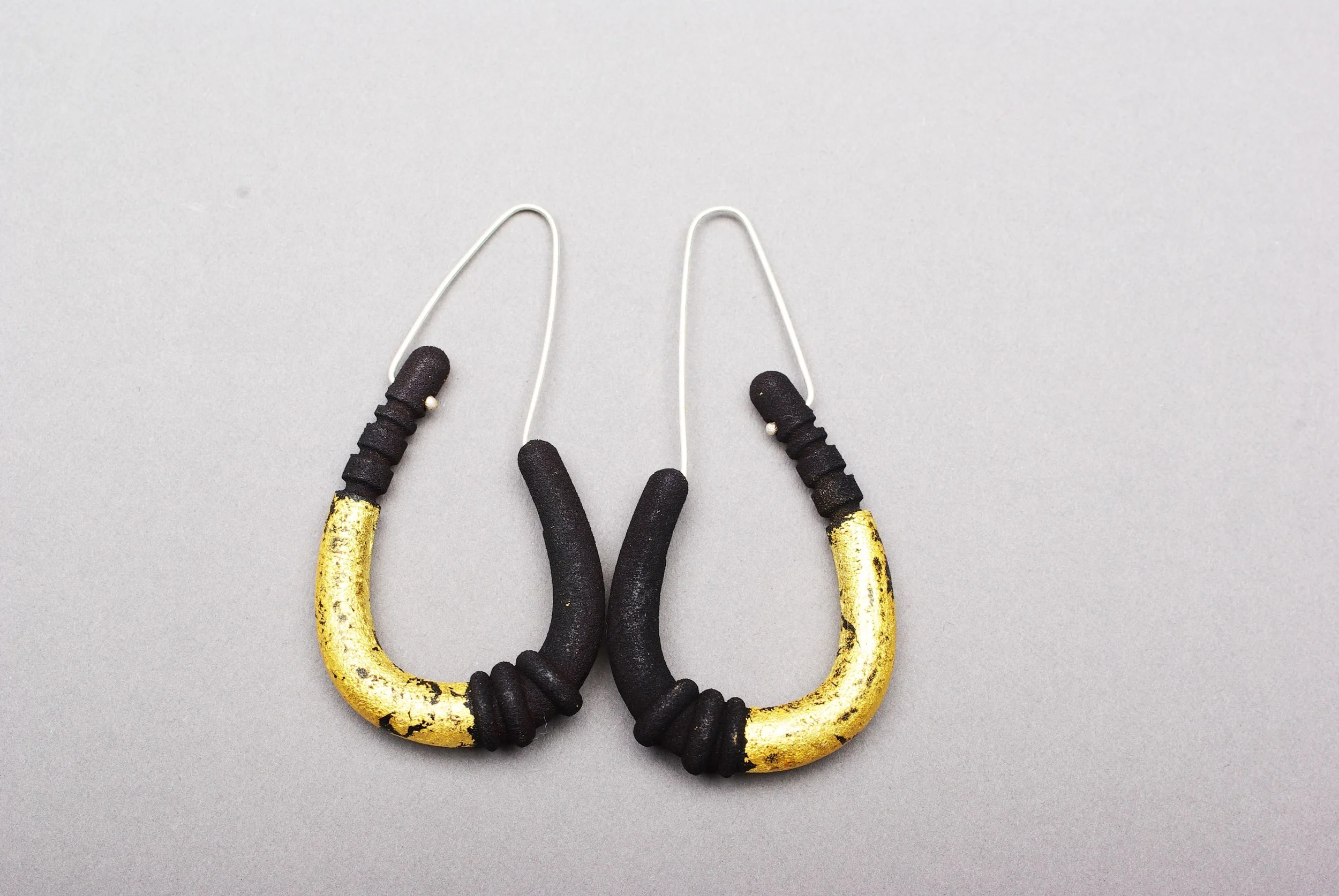 living soil earing black.jpg