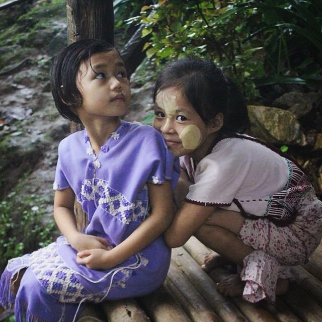 Reserved glances from two girls wearing traditional Karen dresses. 
#Karenpeople #Karenstate #Myanmar #Burma #asia #everydayasia #maelaoon