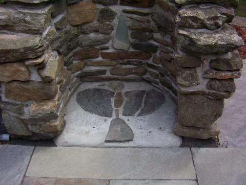 Custom stone fireplace with center design