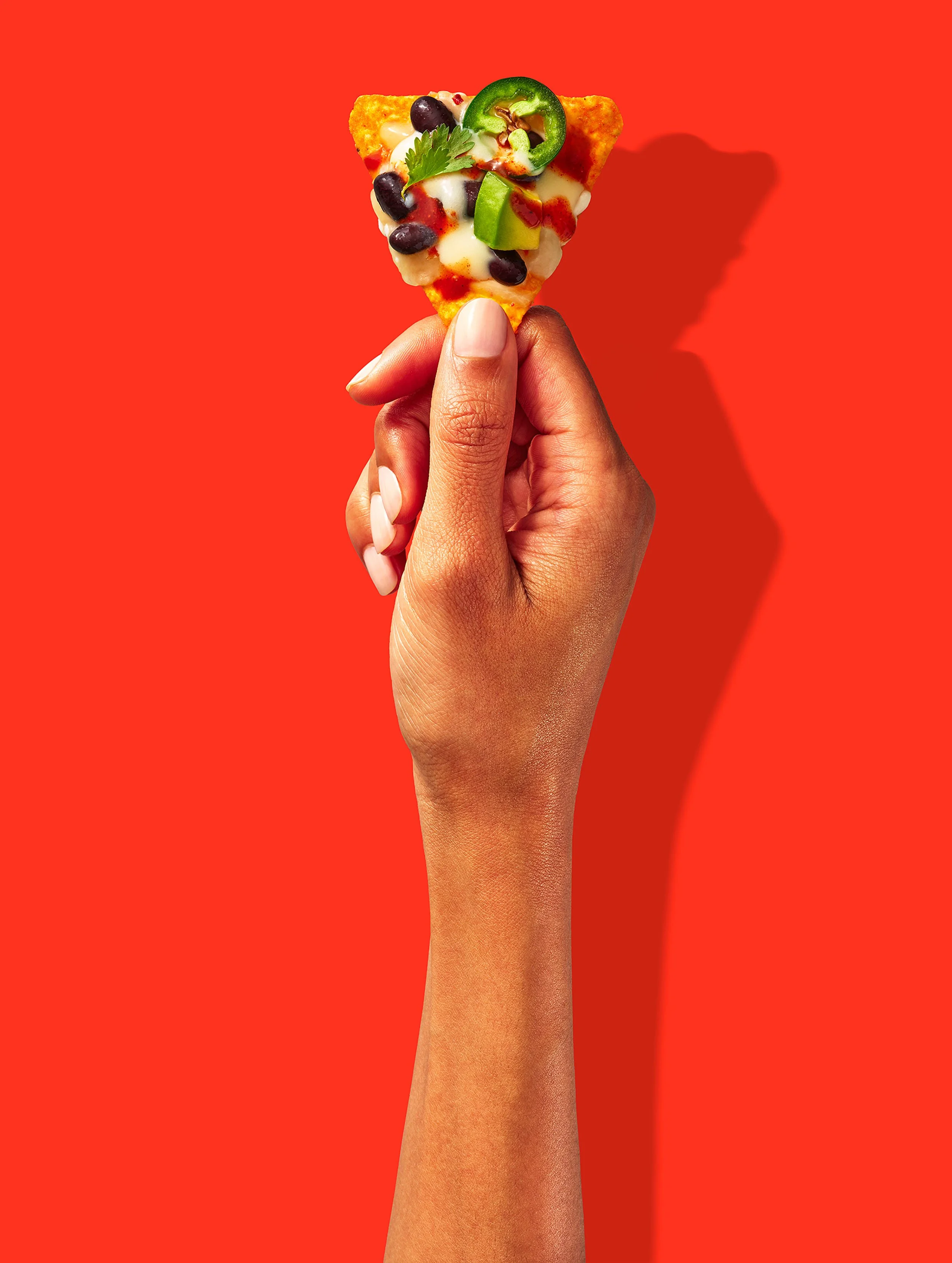 Doritos_Nacho_singlechip_loaded_withhand_v1.jpg