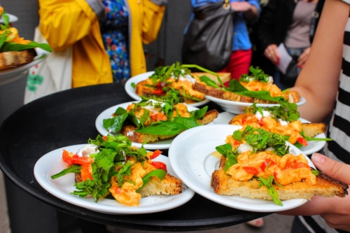 A popular dish, Eggs Menemen, a Turkish dish of soft scrambled eggs with whipped feta yogurt, mixed roast peppers and a mix of chili & red onion on top.