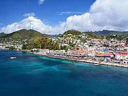 Located in the southeastern Caribbean just north of Trinidad and Venezuela, the country itself comprises the main island Grenada, occupying 344 square kilometres with St George's as its capital, and is surrounded by a number of smaller islands.