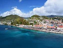 Located in the southeastern Caribbean just north of Trinidad and Venezuela, the country itself comprises the main island Grenada, occupying 344 square kilometres with St George's as its capital, and is surrounded by a number of smaller islands.