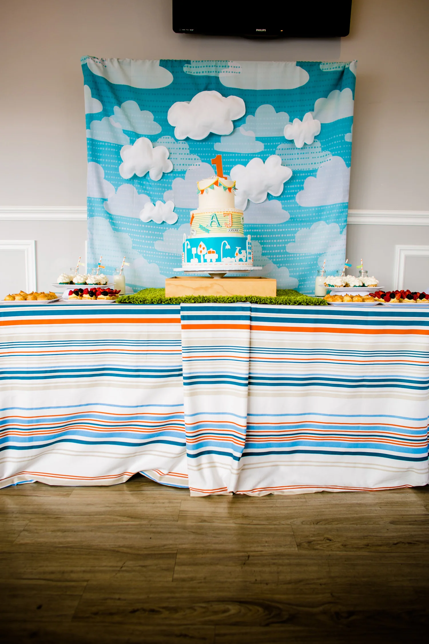  skyboxeventproductions.com | 1st Birthday Party at Chubby Cheek Cafe with Orange, Blue, Yellow, and Green Details | Skybox Event Productions | Conrad Lim Photography | Southern California Birthday Party Planning and Design 