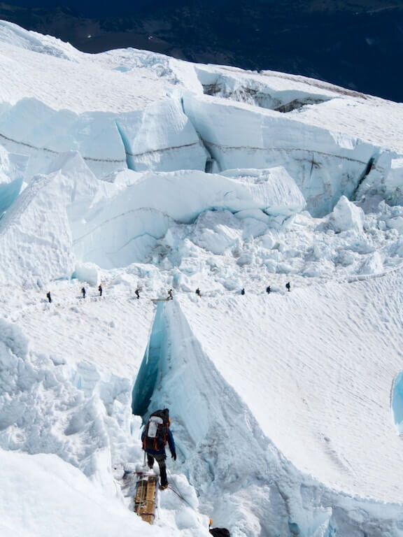 people doing an iceberg hike. 
