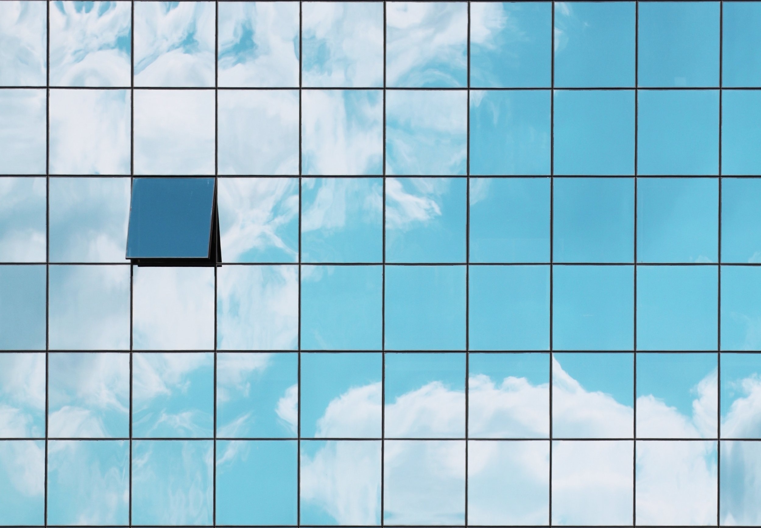 building-clouds-facade-412842.jpg