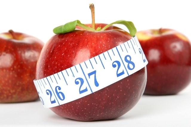 apple with tape measure