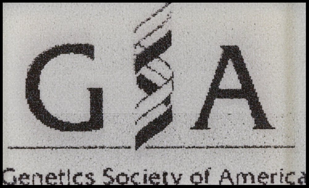 Genetics Society of America Logo. 24,576 biopixels. Printed by Jasmine Temple.