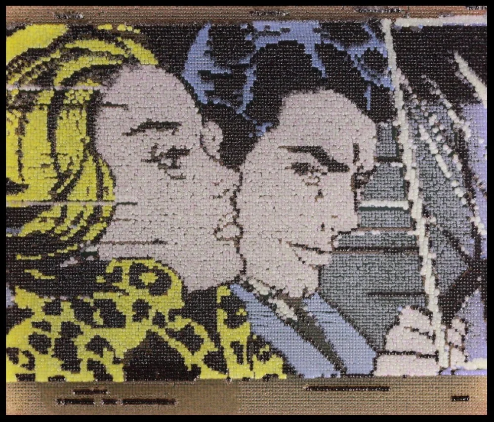 This piece is a yeast adaptation of Roy Lichtenstein iconic painting In the Car . Printed in red, yellow, white, black, blue, purple, and pink yeast, the bold popart style of Lichtenstein lent itself perfectly to yeast art. 24,576 biopixels Adapted from Roy Lichtenstein, printed by Jasmine Temple.