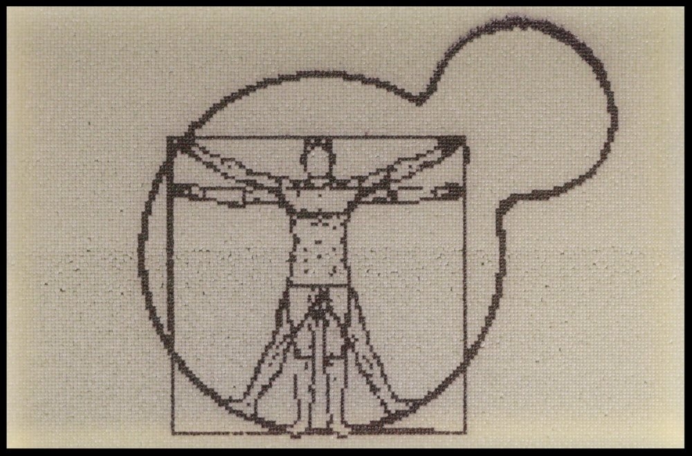 This image was printed in black and white yeast and was inspired by Leonardo da Vinci's Vitruvian Man . Unlike the original, this piece incorporates some of our labs focus on humanizing yeast by integrating human gene pathways into yeast. 24,576 biopixels. Designed and printed by Jasmine Temple.