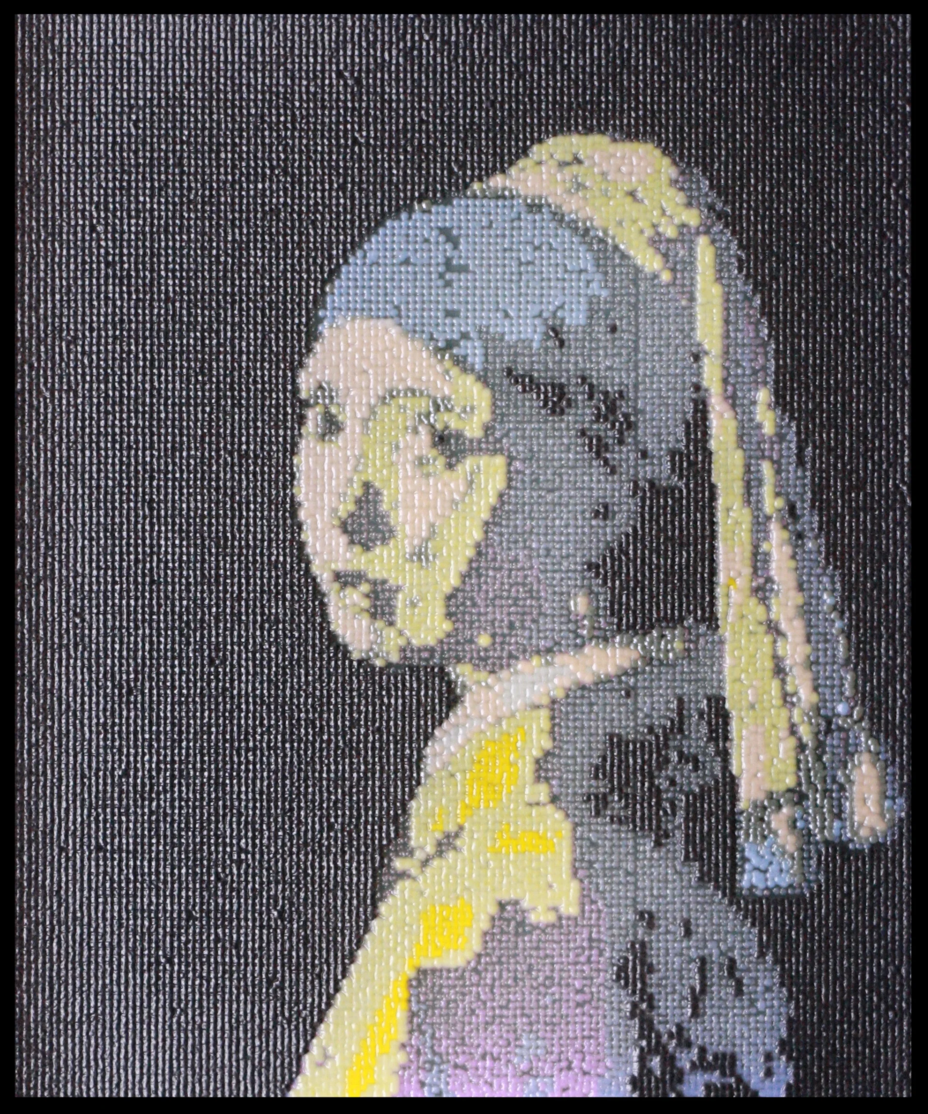 The Girl with the Pearl Earring painted by Johannes Vermeer, printed in yeast strains, evoking the soft oils in the original 1665 painting. 24,576 biopixels. Printed by Jasmine Temple.