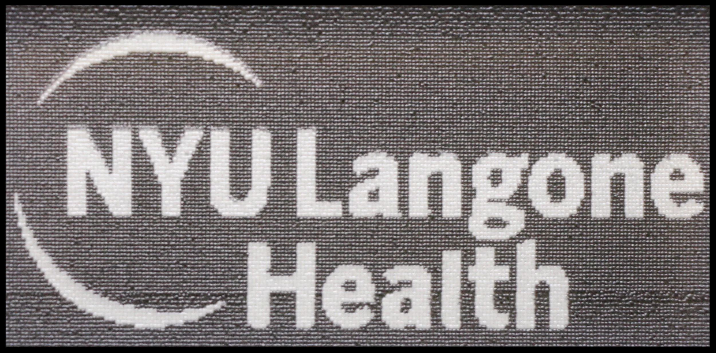 NYU Langone Health logo printed in black and white yeast.   Printed by Jasmine Temple 
