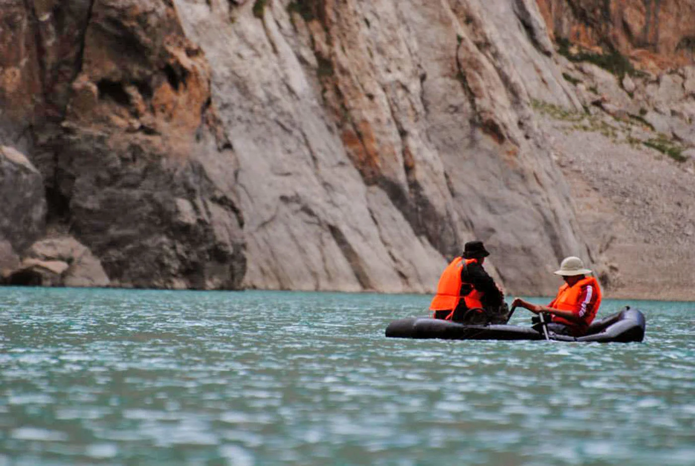 We've been boating like this for around 2 km. Rowing is not as easy as it may seem. You get tired quickly. And it's windy on top of that. By the way, the water gets into a boat if you are not rowing properly. Pack you stuff (a camera, for example) in water resistant bags. Your boots will get wet though. Photo: Azamat Imanaliev