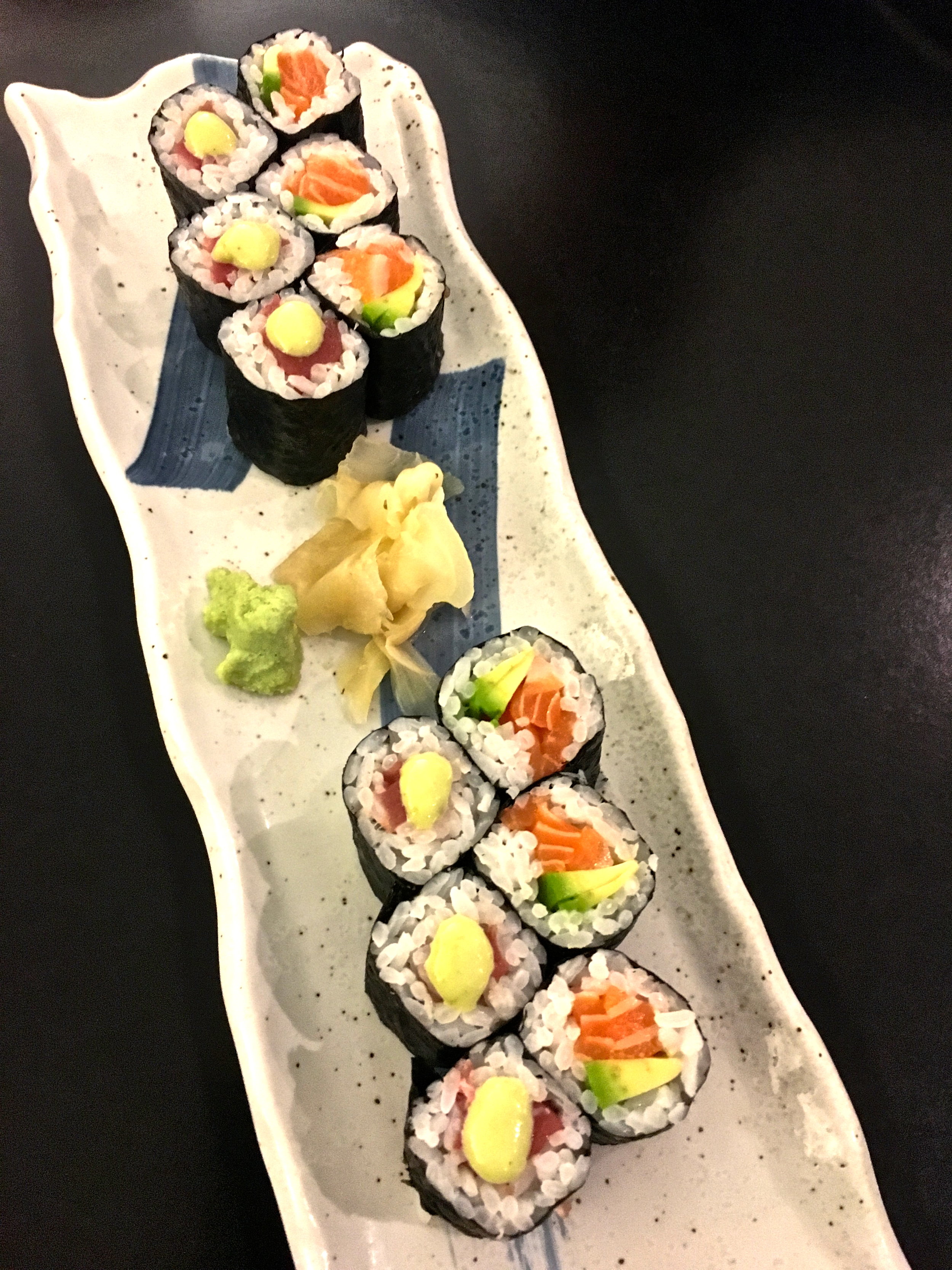 Salmon and avocado rolls and spicy tuna rolls