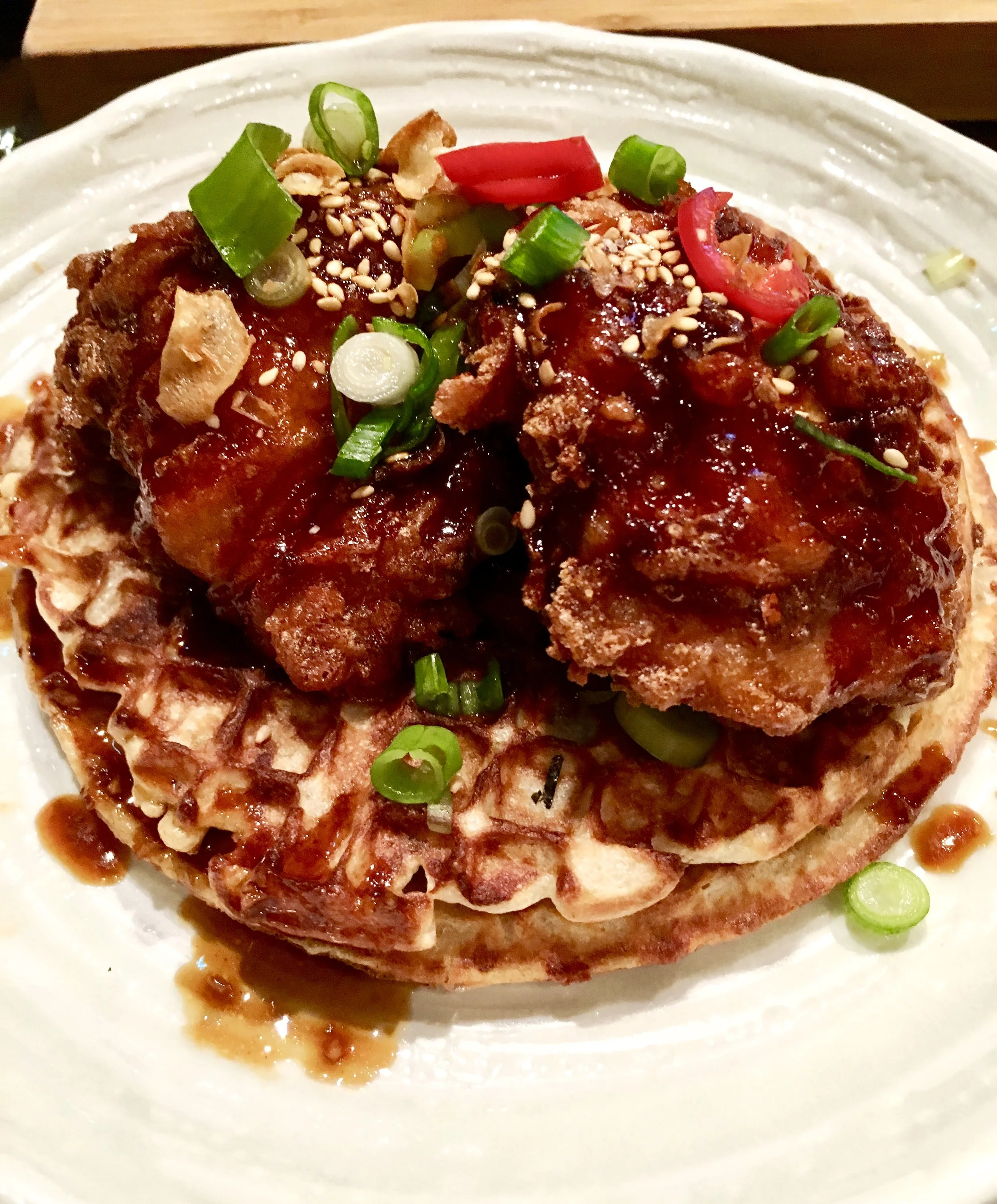 Korean fried chicken (signature dish at Jinjuu Soho) on spring onion pancakes