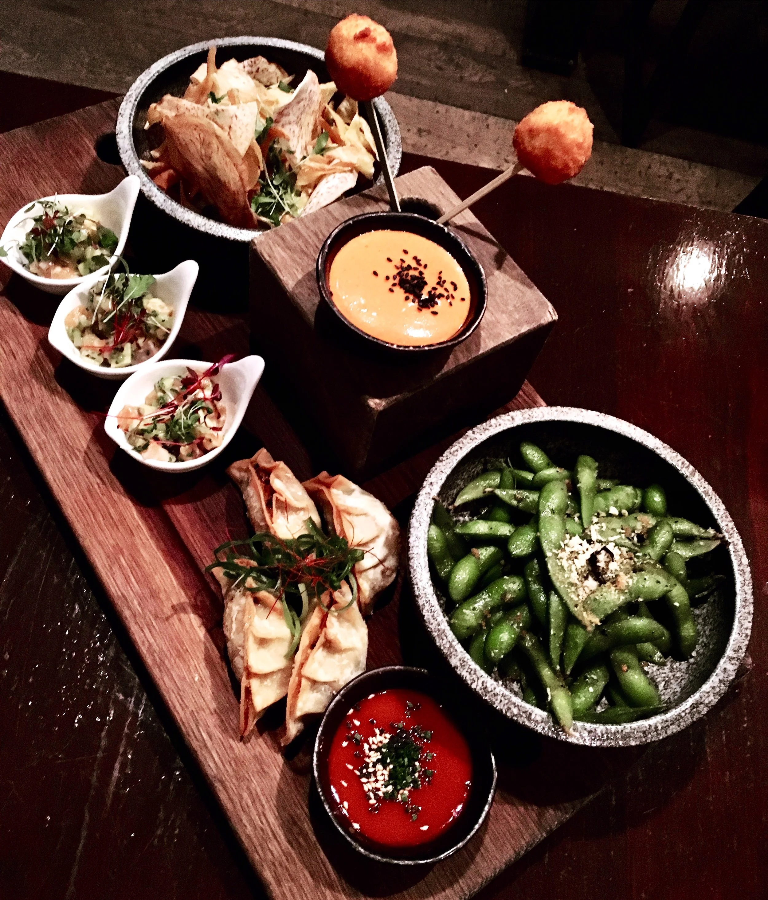 Edename, Sae-Woo Pops, Philly Cheesteak Mandoo, Yura cured salmon and avocado, Vegetable Crisps with tomato soya and kimchi guacamole at Jinjuu Soho