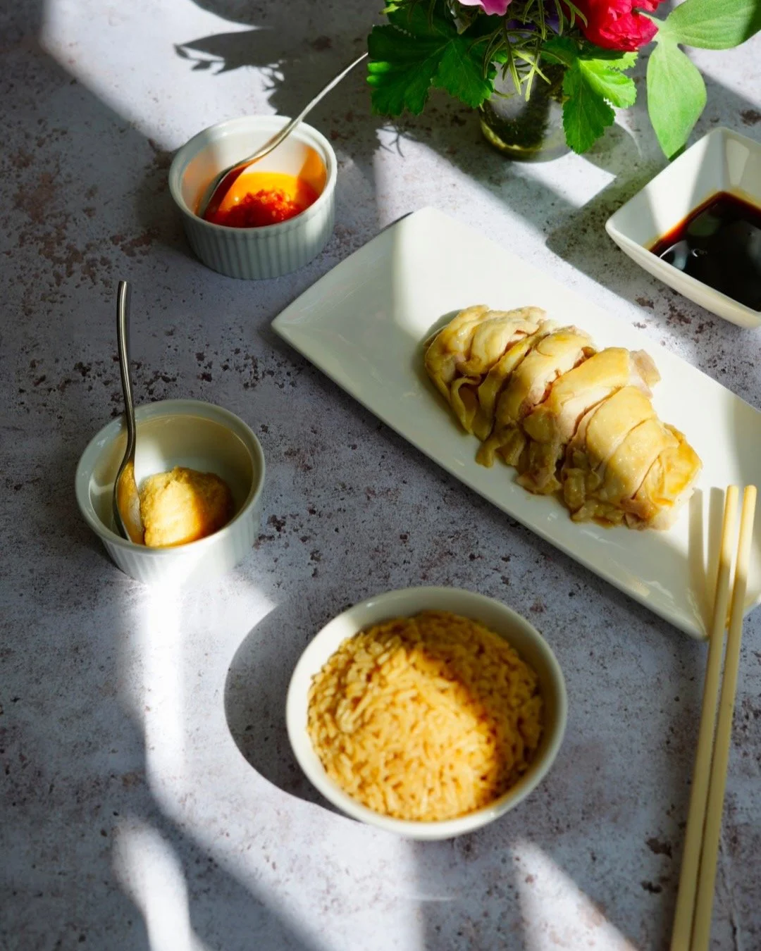 I was inspired to make my own Hainanese Chicken rice following my recent trips to Singapore and Hong Kong. Gently poaching the chicken does it. I used my homemade chicken stock to flavour the rice, giving it real depth. I then paired the super tender