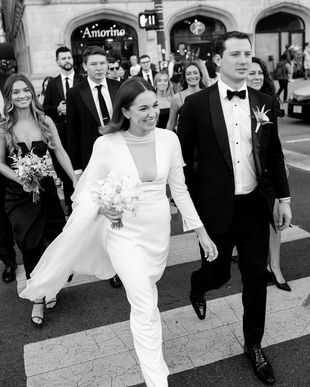 Stopping traffic and turning heads in our signature custom tuxedo 📸 
. . .
Congrats Kevin &amp; Nora!
 #bespoke #menswear #groom #mensfashion