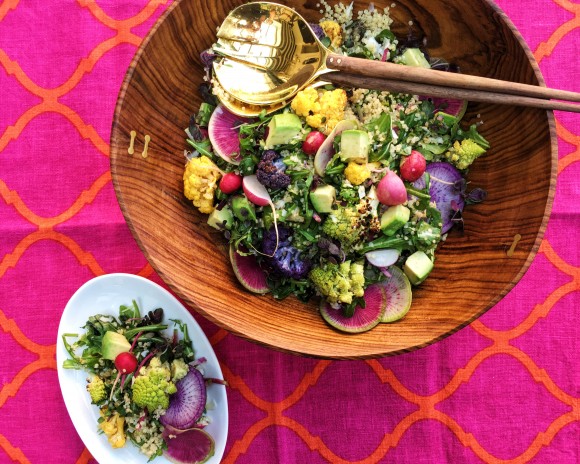 When spring produce starts flowing into our markets, I get really excited about making salads. There are so many veggies to play with, the options are endless. This salad is a combination of some of my favorite, really colorful market vegetables, paired with one of my favorite fillers, quinoa. The colors in this salad are so beautiful together, they make me think of spring. The combination of roasted cauliflower, crunchy radishes, creamy avocado, nutty quinoa, peppery arugula and bright, lemony vinaigrette make this salad a delicious side dish for pan seared chicken or roasted salmon, or as main course on a warm spring day. If you love cheese, feel free to add some grated Pecorino Romano or crumbled feta to the quinoa for added flavor. If you love the Sanet rosewood bowl that this salad is being served in or the Nicola brass salad serving pieces , you can buy them from Alfred through the links, or at Alfred’s shop at 218 Columbus Ave in San Francisco. Total Time: 45 minutes Serves 8 to 10 as a side dish Ingredients Quinoa 1 cup uncooked white or golden quinoa 1½ cups water ½ teaspoon salt Salad Vegetables & Greens 1 small head yellow cauliflower, cut into small florets * 1 small head purple cauliflower, cut into small florets * 1 small head romanesco or 1 small head broccoli, cut into small florets ¼ to ½ cup neutral flavored oil like Thrive® oil or avocado oil for roasting vegetables ½ teaspoon kosher salt 1 teaspoon salt ½ teaspoon pepper 1 bunch Easter egg radishes, greens trimmed, cut into halves or quarters 1 small purple daikon radish, thinly sliced into rounds with a knife or mandoline (optional) 1 watermelon radish, thinly sliced into rounds with a knife or mandoline (optional) 4 handfuls baby arugula leaves 1 large ripe avocado, diced just before serving *If you can’t find different colored cauliflower just buy 1 large head white cauliflower. Lemon Vinaigrette ½ cup champagne or white wine vinegar 2 teaspoons packed lemon zest ¼ cup fresh lemon juice 1 tablespoon Dijon mustard ½ cup minced or finely chopped shallot 2 large garlic cloves, finely chopped or grated 1 tablespoon honey 1 teaspoon salt ½ teaspoon ground pepper 1¼ cups neutral flavored oil like Thrive® oil or avocado oil Preparation Preheat the oven to 425° F. Quinoa Place quinoa in a fine sieve, and put the sieve inside a large bowl. Cover quinoa with cold water. Using your hands, rub grains together for 30 seconds; rinse and drain well. Combine 1½ cups water, quinoa, and ½ teaspoon salt in a medium saucepan; bring to a boil. Cover, reduce heat, and simmer for 10 to 15 minutes or until liquid is absorbed. Remove from heat; fluff with a fork and let cool to room temperature. Salad Vegetables & Greens Toss the cauliflower and romanesco with enough olive oil to lightly coat, the salt and pepper, then transfer to a lined baking sheet. Roast for 10 to 15 minutes, or until just cooked through and golden at the edges. Let cool to room temperature. Lemon Vinaigrette Put all of the salad dressing ingredients except the olive oil in a bowl and whisk until well combined. Slowly add the olive oil while whisking – this will help to emulsify the dressing. To Serve In a large serving bowl, drizzle the quinoa with ½ cup of the salad dressing and a sprinkling of salt and pepper, tossing to coat. Add the roasted vegetables, radishes (reserve a few to garnish with) and arugula and drizzle more dressing over the salad and toss again. Add the avocado and gently toss once more. Garnish with remaining radishes and serve right away.