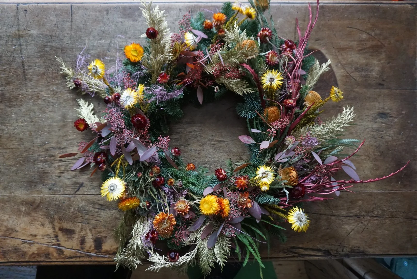 Flaming ramparts tablecentrepiece Alice McCabe Flowers.JPG