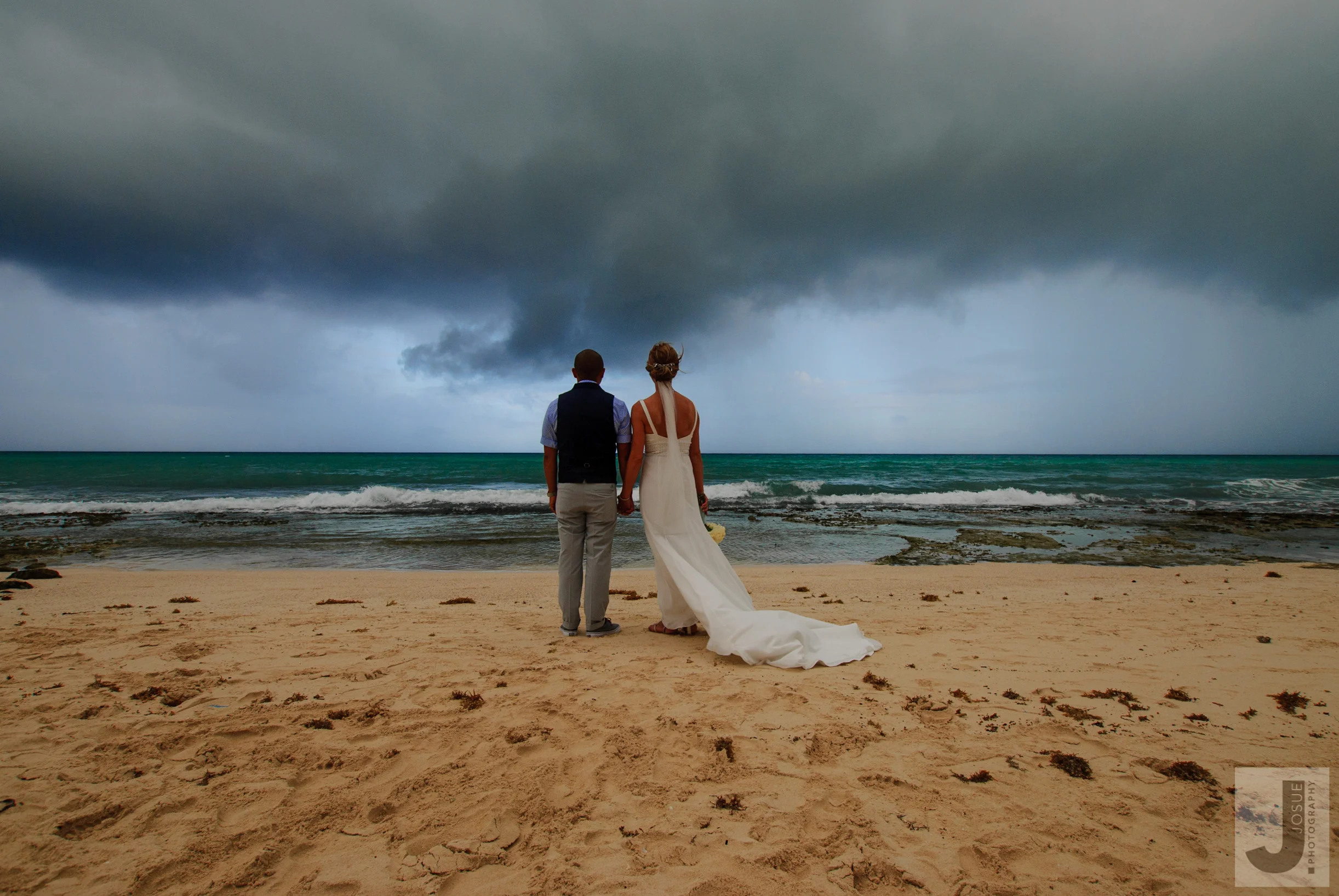 Ryan and Sonya were game for anything. My favourite moment of the portrait shoot was when we led them down the beach and we could see a major storm heading our way. We played our luck and got an epic shot them staring down the storm. but it won as we got drenched in the rain. 