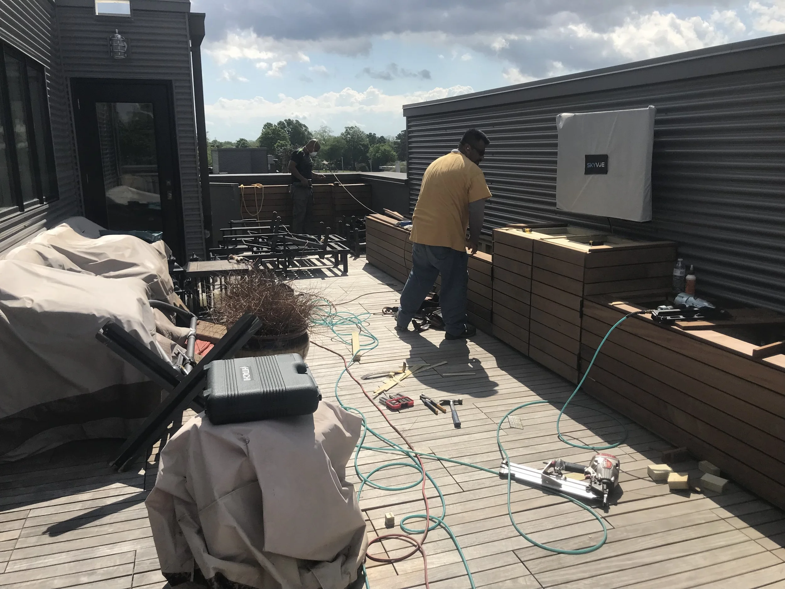  Hardwood roof top cabinetry, low planter boxes, high tree planters 
