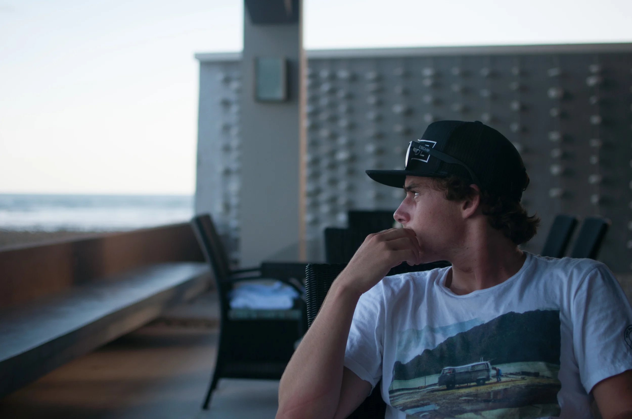 THIS IS THE AT THE TABLE, AND WE PRETTY MUCH JUST SAT LIKE THIS AT EVERY MEAL JONESING TO GET OUT IN THE SURF