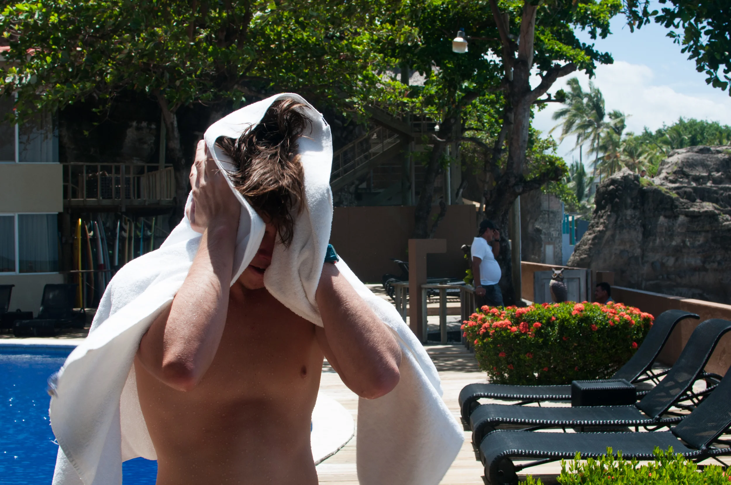 AFTER YOU SHOWER THEY TAKE YOUR BOARD AND HANG IT UP, PUT A TOWEL ON YOUR HEAD, AND HAND YOU A GIANT WATER BOTTLE