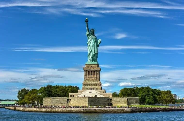 The Statue of Liberty, whose pedestal Emma Lazarus helped fund with her 1883 sonnet "The New Colossus."