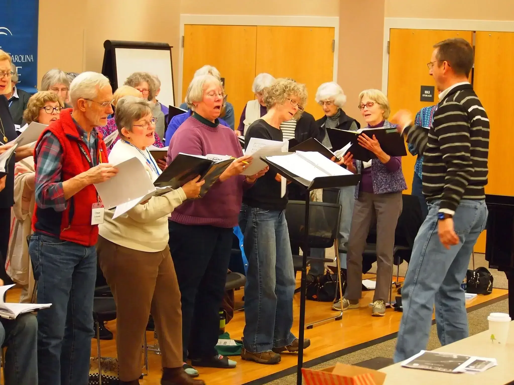 Chuck Taft in a rehearsal with the Asheville Senior Chorus for an upcoming concert.