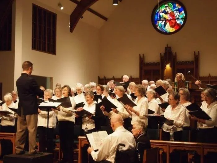 Chuck Taft conducting in a performance in WNC.