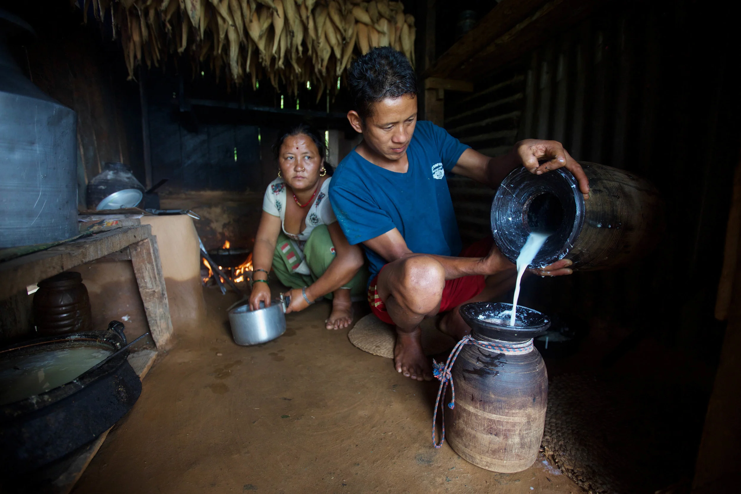Chari, 32, and her husband, Bhoj, 32, prepare food on Aug. 1, 2016.