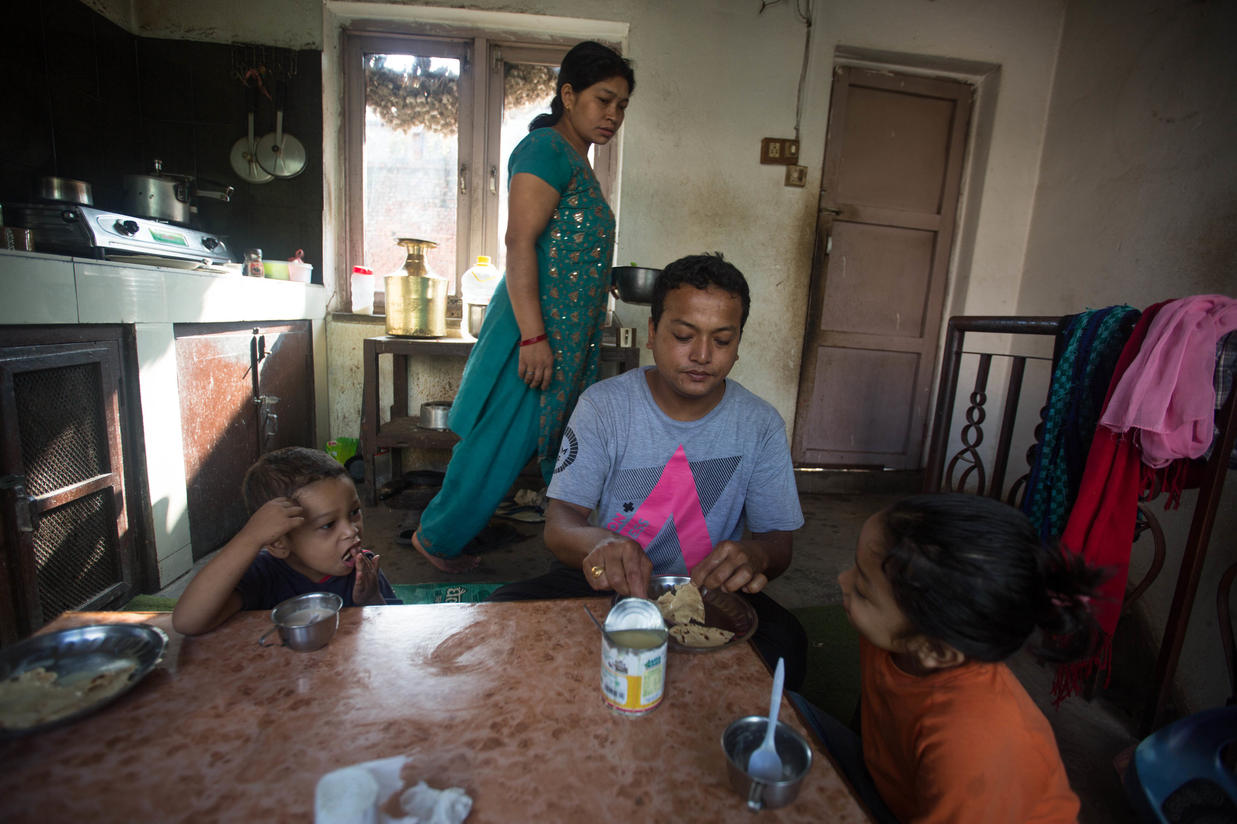 At home, with family, Sweety goes by male pronouns and his birth name, Tirtha. Tirtha and his wife, Uma, had an unwanted arranged marriage, much later in their lives than most Nepali people. They have been married nine years and have two children.
