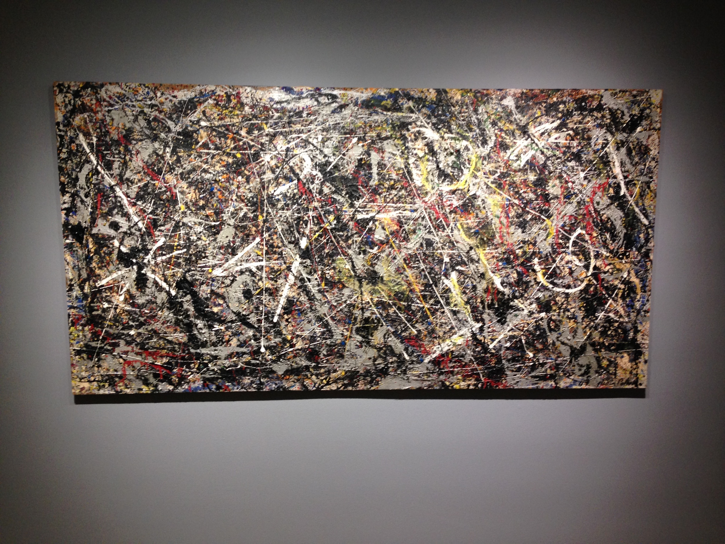 A Jackson Pollock piece on display.