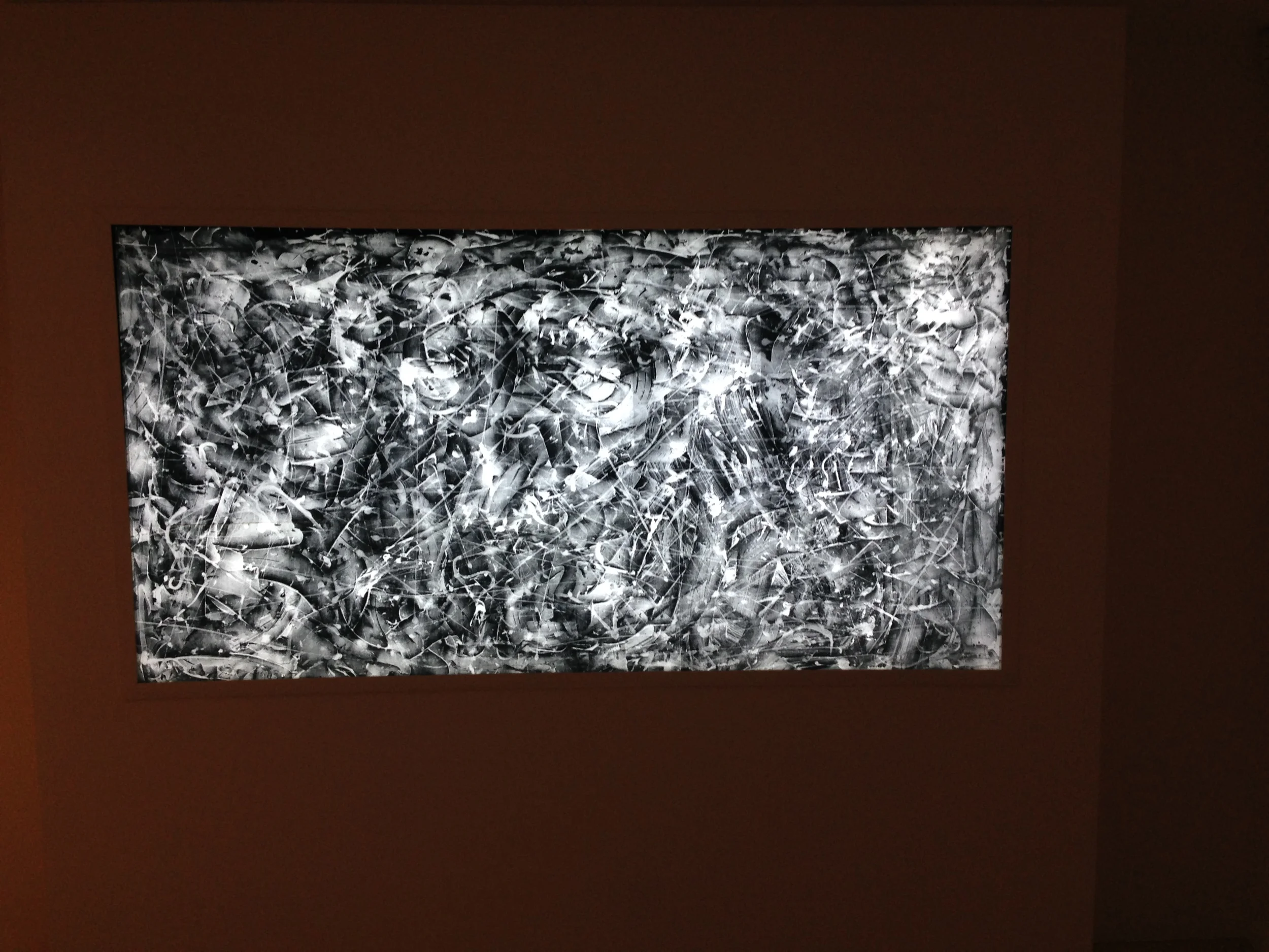 A Jackson Pollock piece on display.