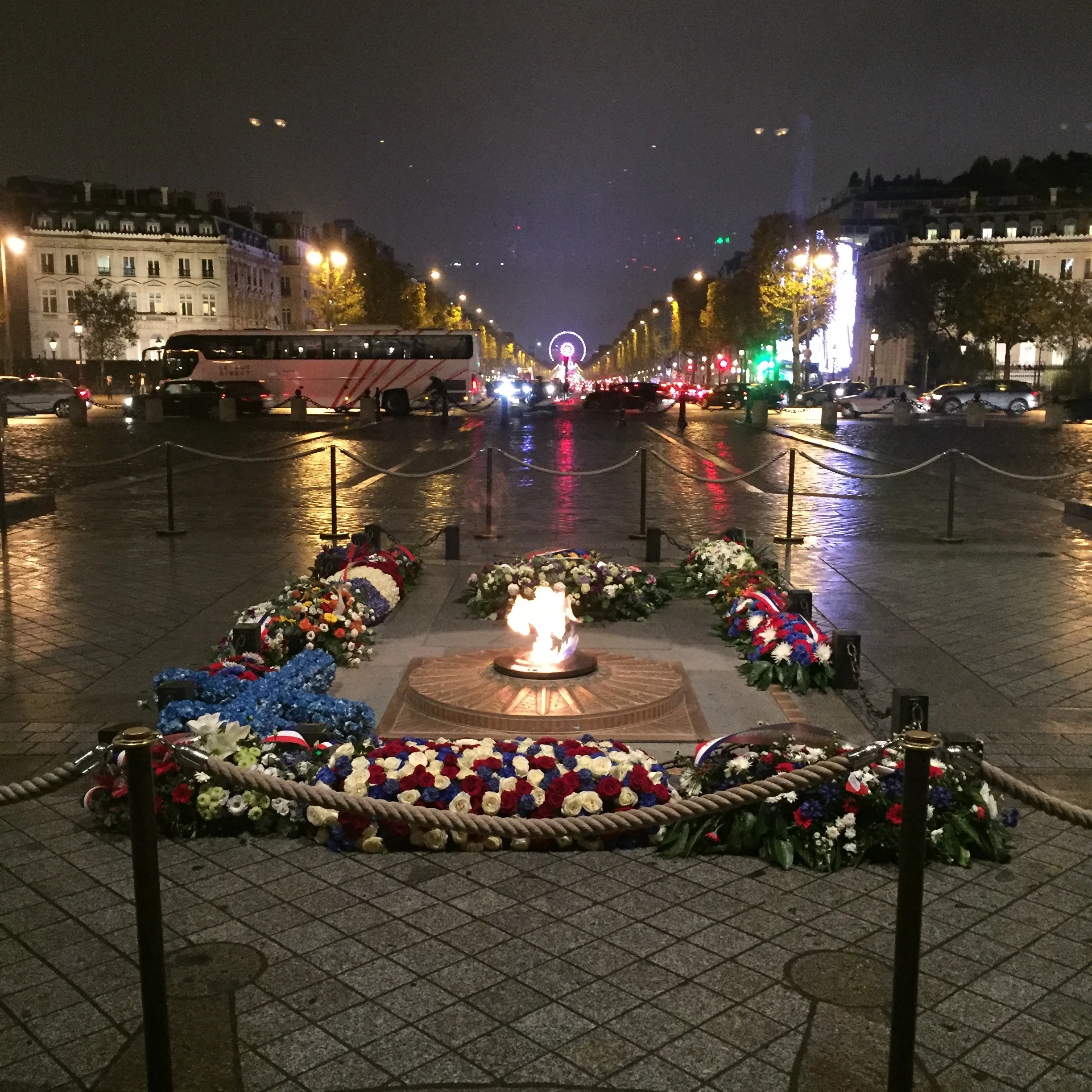 The eternal flame for the unknown soldier at the base of the Arc de Triomphe.