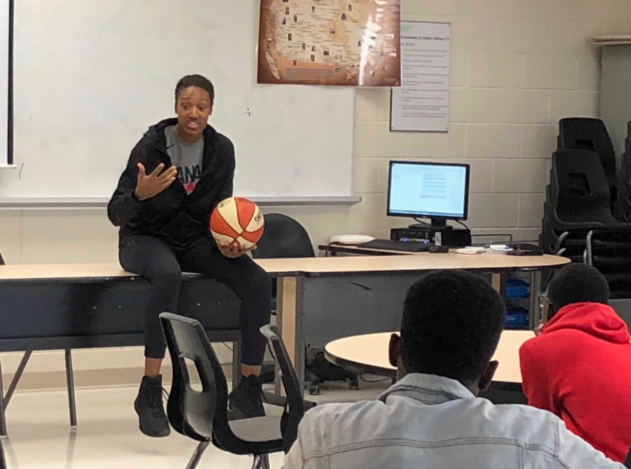 Speaking to High School boys at Louise Arbor Secondary School about the importance of academics.