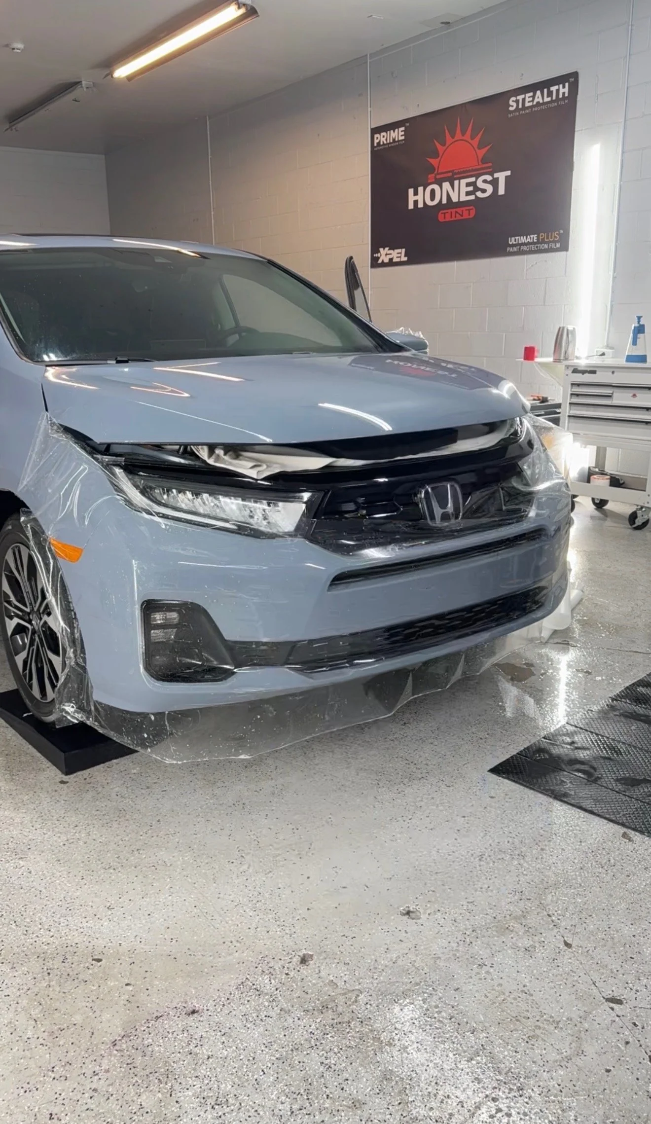 XPEL PPF ULTIMATE PLUS installation on hood by Honest Tint & PPF located in Yucaipa Ca.