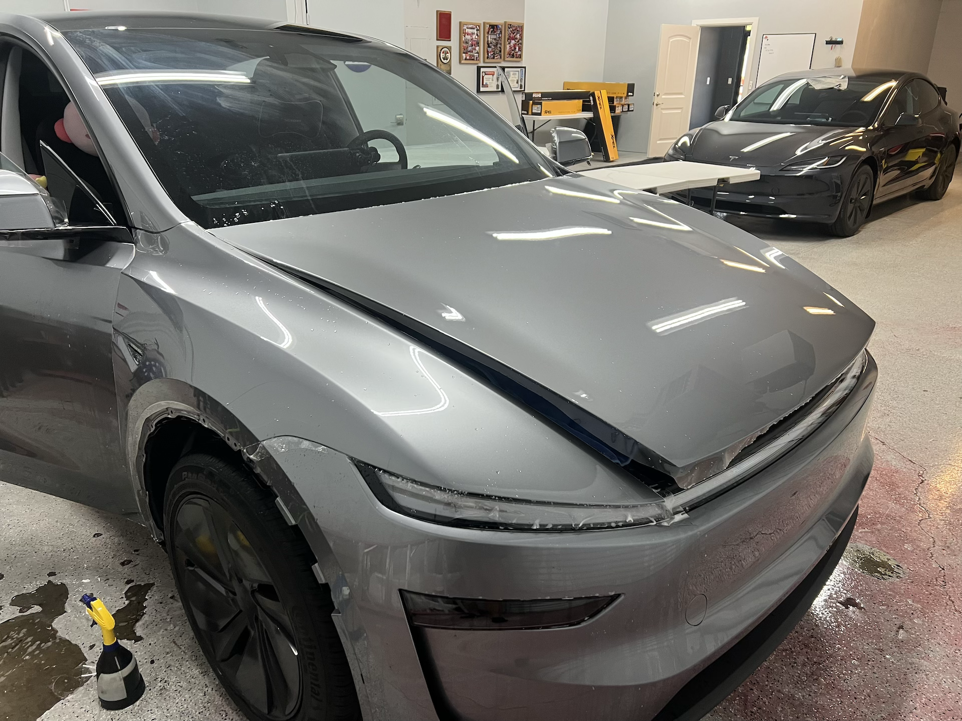 Tesla model Y full front coverage plus doors installed using XPEL ULTIMATE FUSION paint protection film