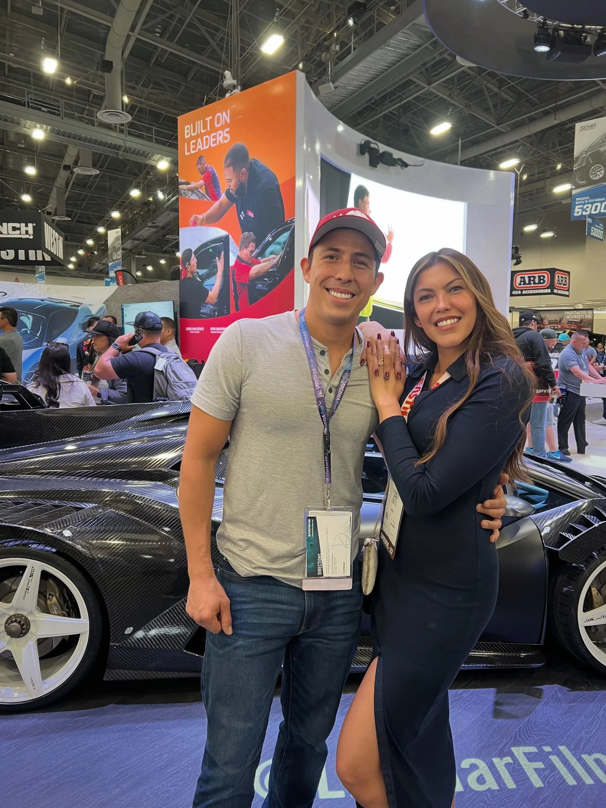 Danny and Liz Munoz during SEMA show where Danny was featured at the Llumar booth for his competition wins.