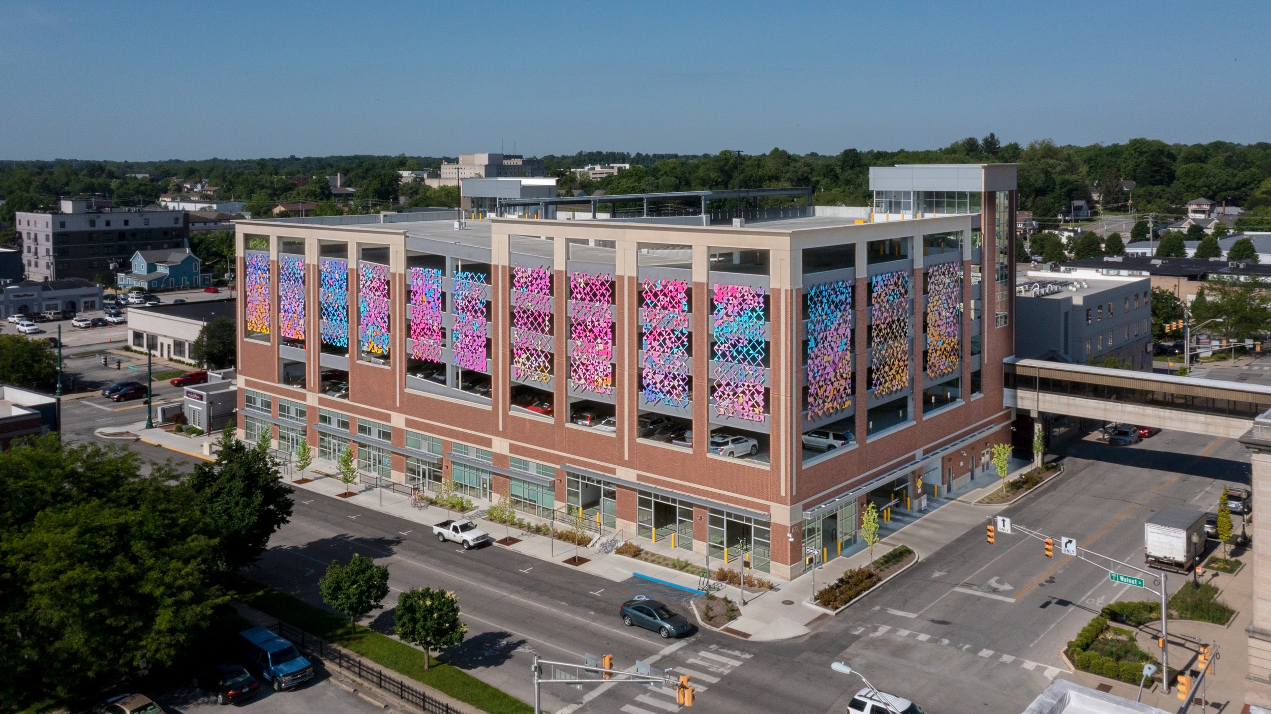 An aerial view photography by Al Ensley of a parking garage in the local community.