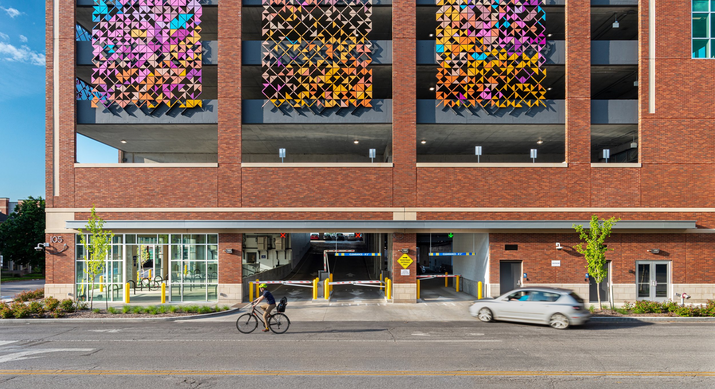 An architectural photography of a communal parking garage.