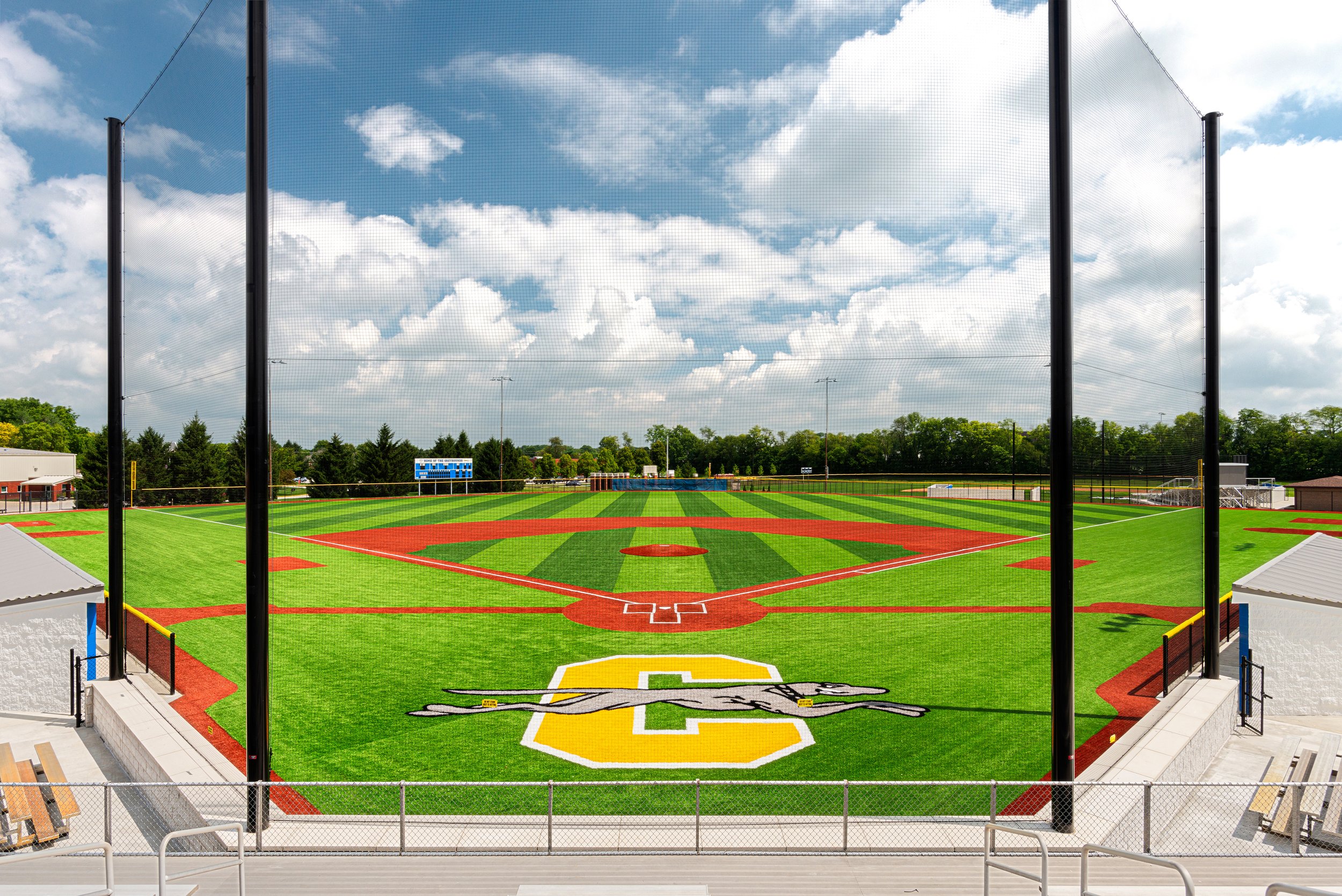 Outdoor photography of a college baseball field.