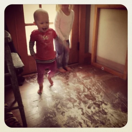 Evalina and Linnea playing in the "snow."