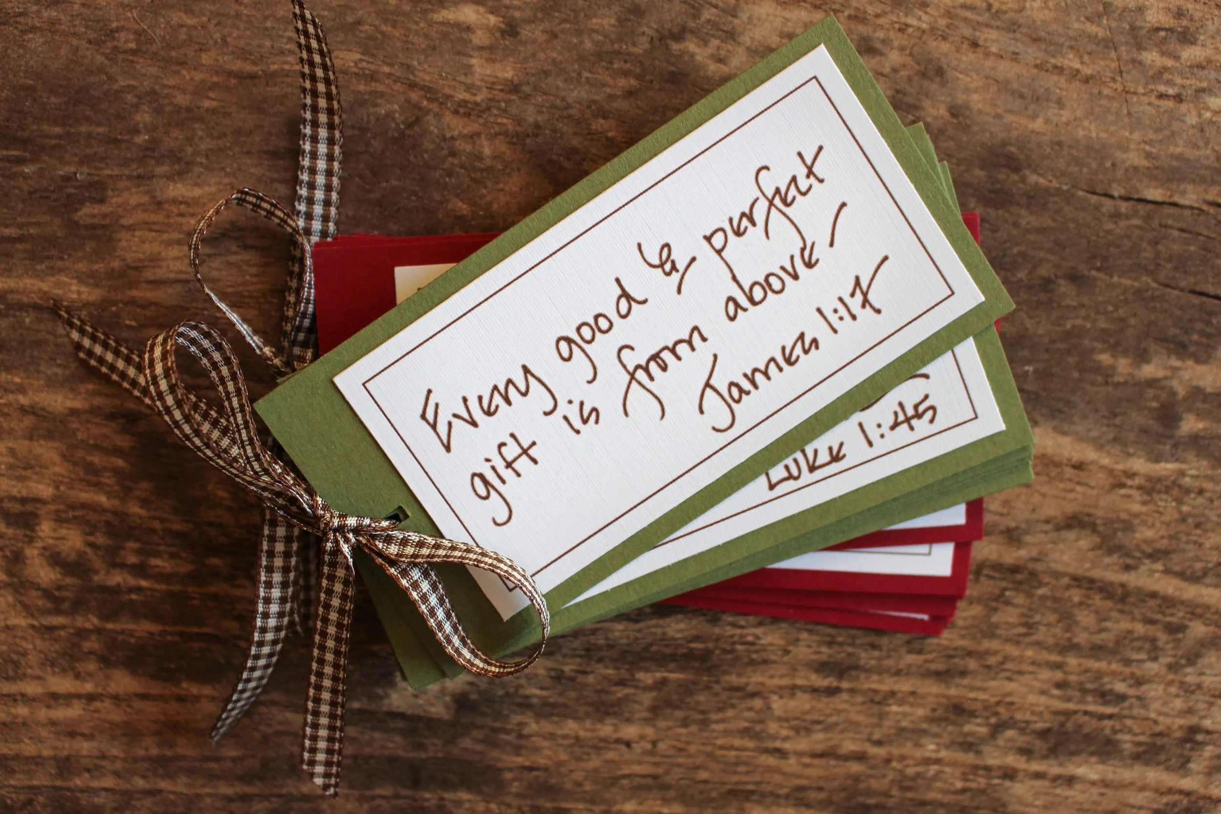 The Original Christmas Verse Book is a small book filled with Bible verses for the holiday season...A reminder of what Christmas is all about, this is a wonderful, encouraging gift that is easy to take with you, mail to a friend or add to a stocking...Each book is gift wrapped and comes in red or moss green...chocolate ink on white stock with a chocolate check ribbon...