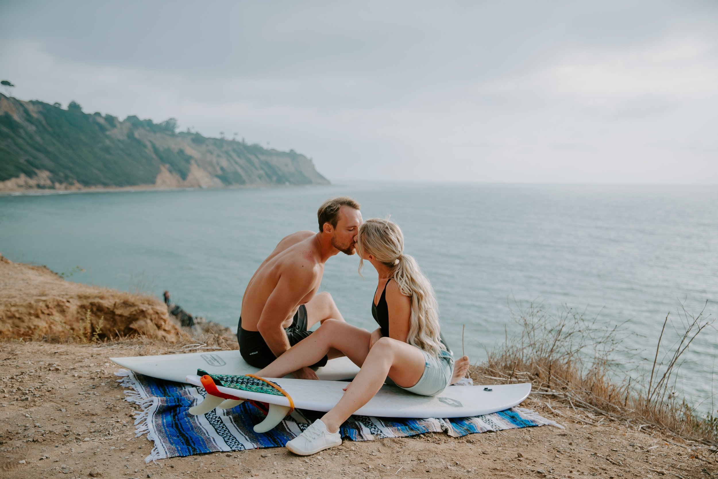 Engagement Shoot Prop Surfboard Guide Luxury Wedding Photography